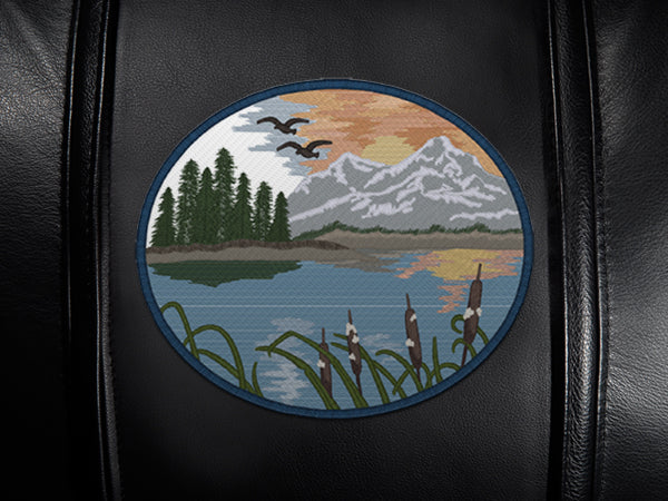 Silver Sofa with Mountain Background Logo Panel